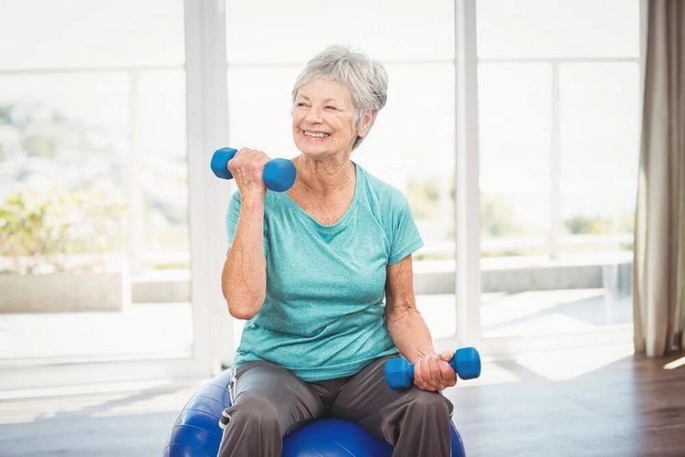 Weight training with dumbbells for older women