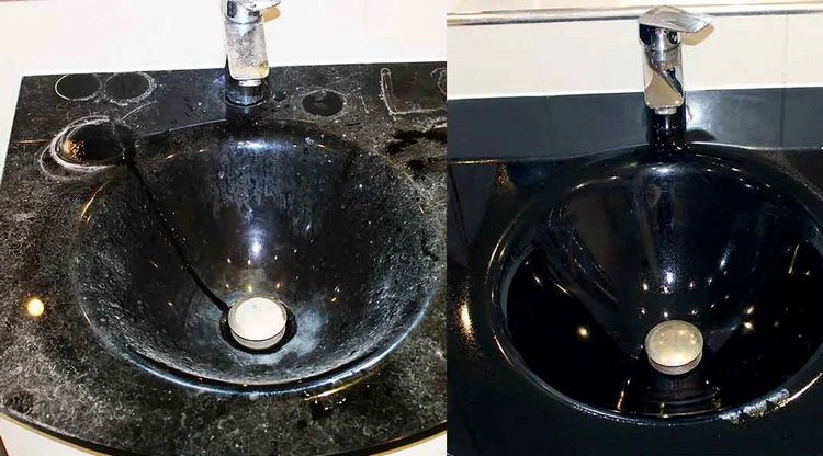 Stark verschmutztes, verkalktes Waschbecken aus Glas reinigen