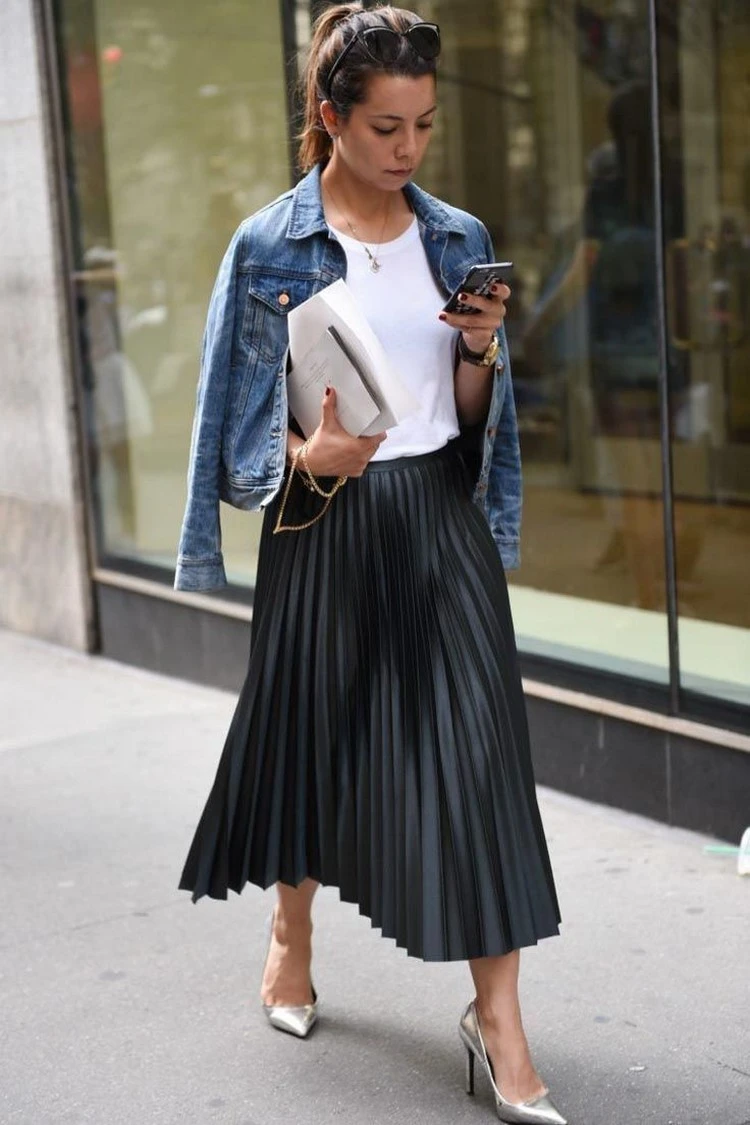 High-waisted pleated skirts are the perfect way to draw attention away from the waist
