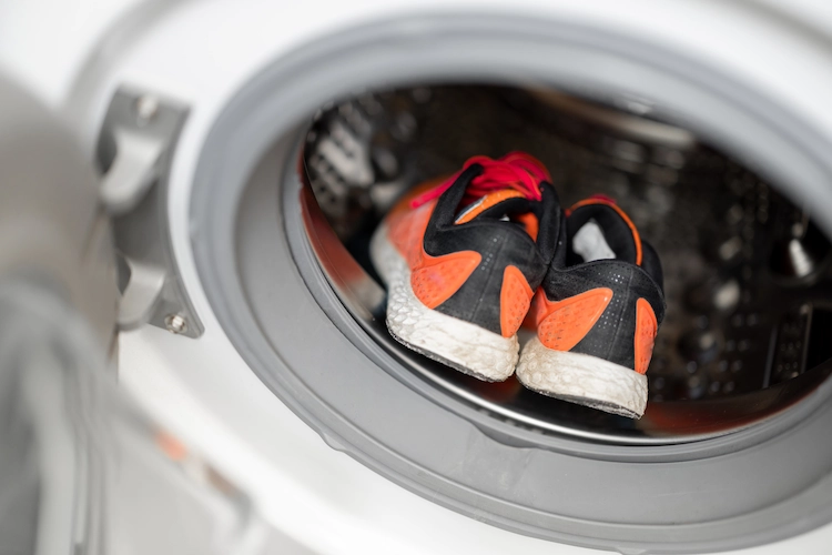 wash running shoes in the washing machine with the insoles and laces removed first