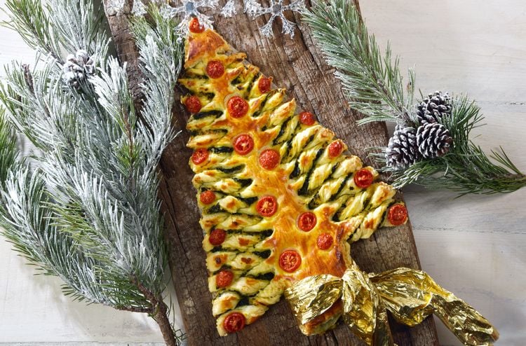 christmas,tree,of,puff,pastry,on,to,a,wooden,board.