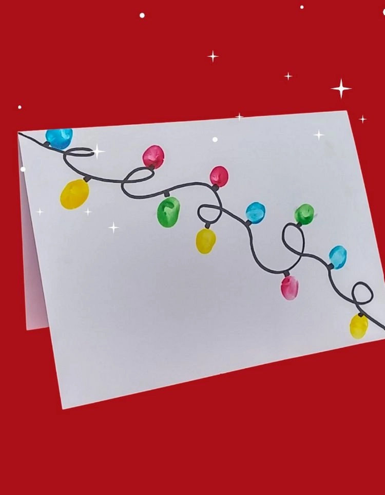 fröhliche weihnachtskarte mit fingerabdruck lichtern