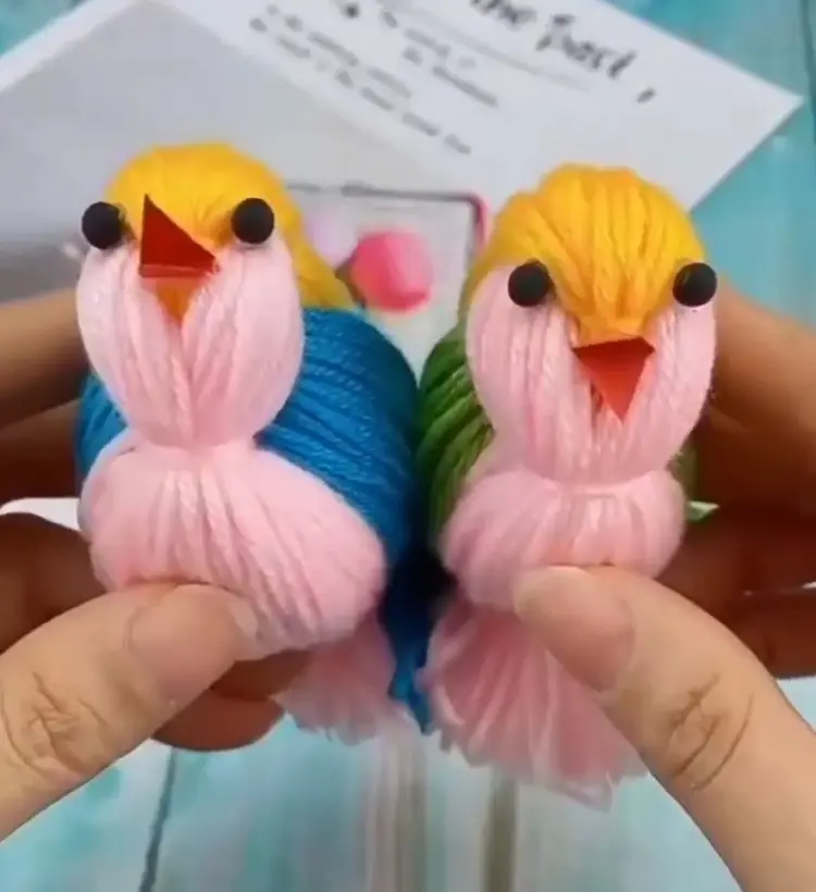 bunte vogelfiguren aus wollfäden selber machen mit kindern