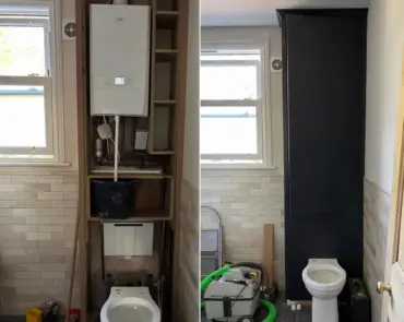 Toilettenspülung und Warmwasserboiler in einem Einbauschrank