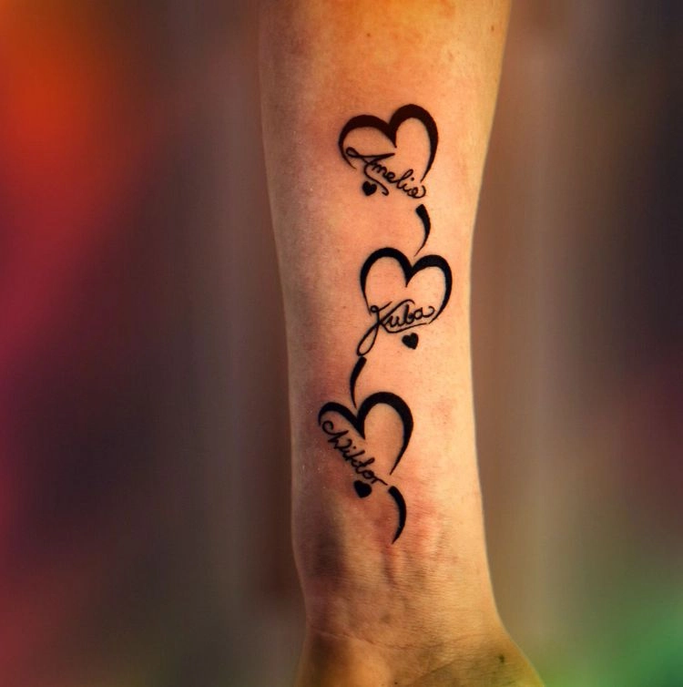 Unterarm Tattoo Herz mit Namen