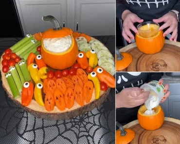 Gemüseplatte für Halloween mit Dip in einem Mini-Kürbis