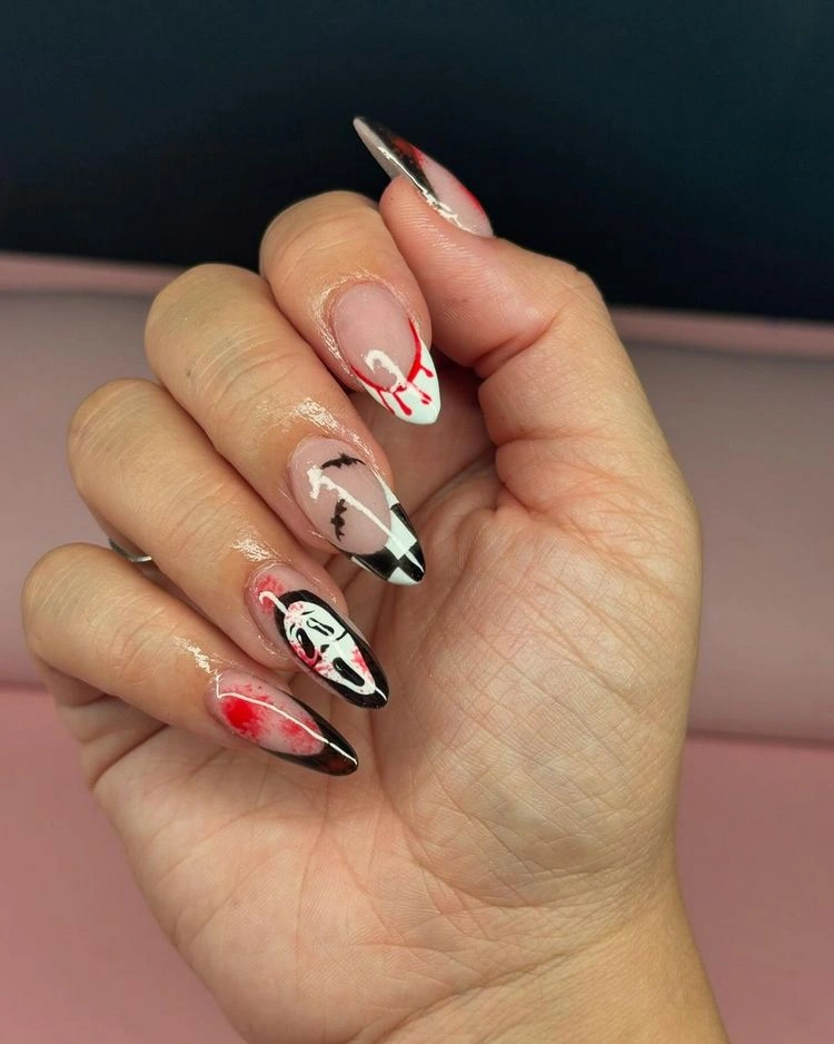 Gruselige Halloween Nägel mit Blut als Design - Bilder und Ideen