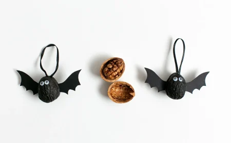 Last Minute Halloweendeko mit Walnüssen und Tonpapier für kleine Fledermäuse