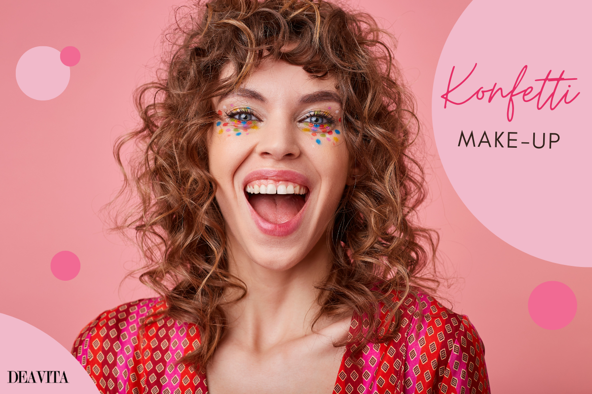 frau mit konfetti make up lachend