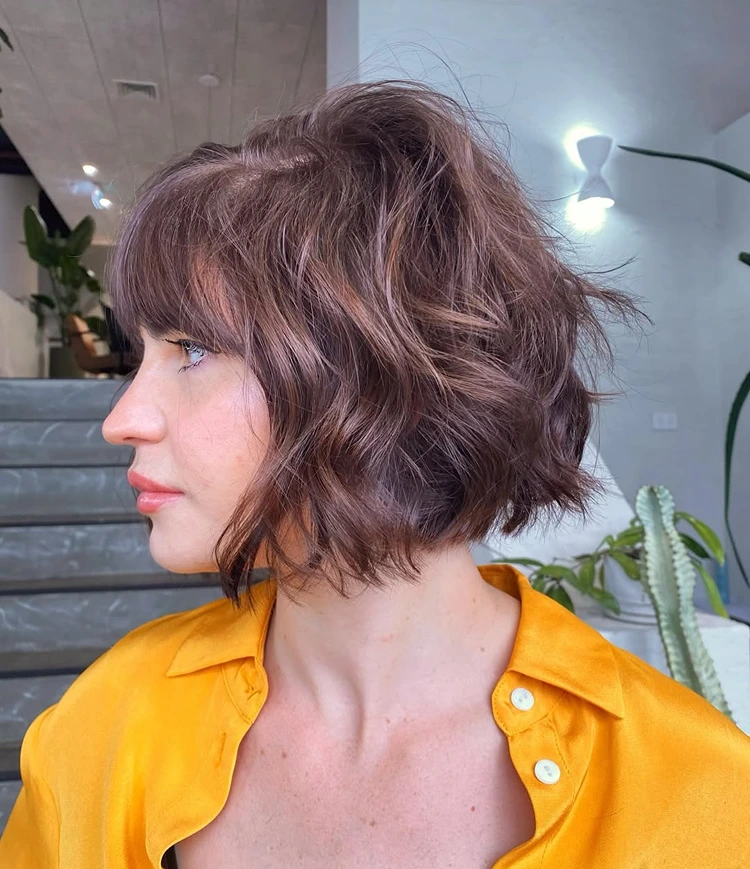 wavy bob mit bogen am nacken