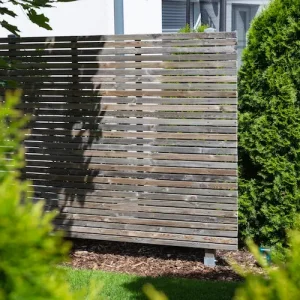 Sichtschutzzaun aus Thermoholz selber bauen Anleitung