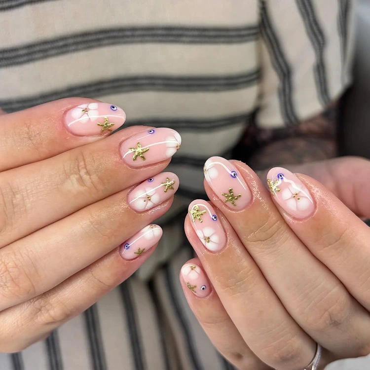 blooming gel nageldesign für urlaub mit bösem auge motiv
