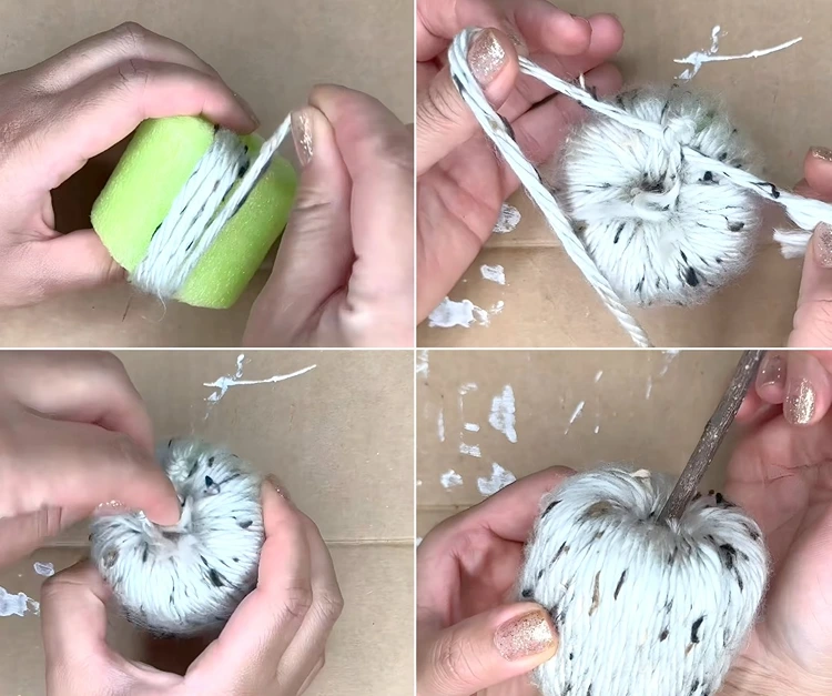 Die Basis mit Wolle umwickeln und mit einem Zweig dekorieren