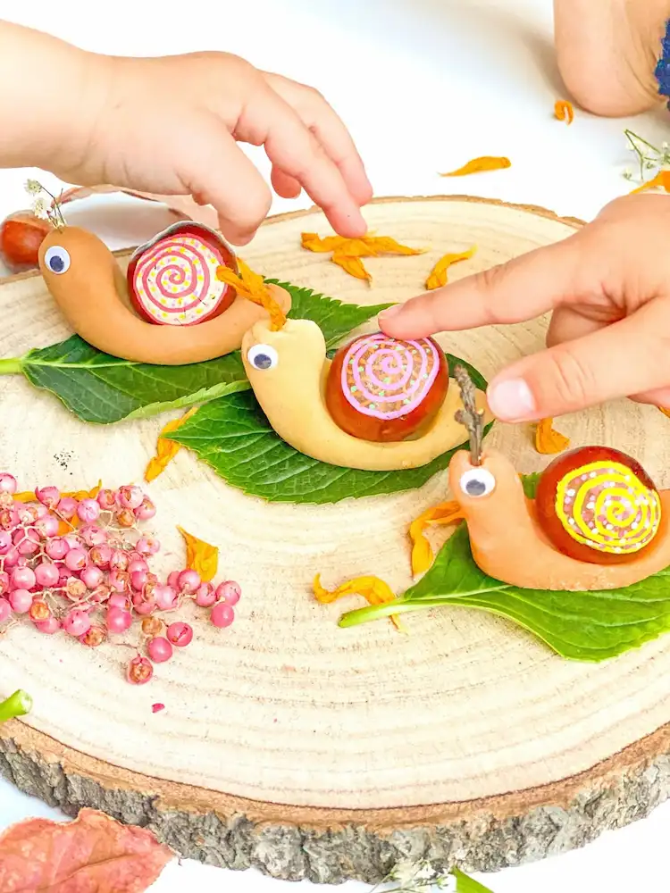 Herbstdeko selber machen Schnecke aus Kastanien basteln Ideen