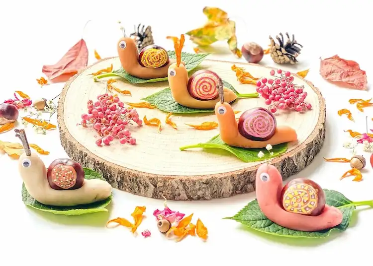 Schnecke aus Kastanien und Modelliermasse basteln