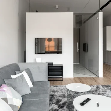 wohn und schlafbereich mit trockenbauwand – moderne 1 zimmer wohnung