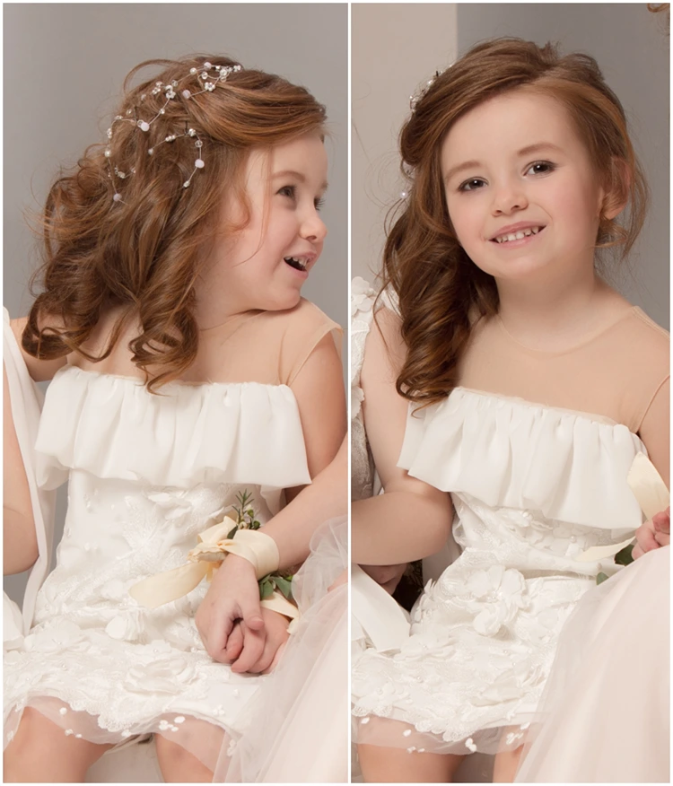 halboffene kinderfrisur mit seitlichem schwung und zartem haarschmuck