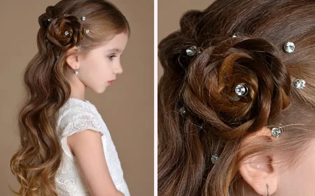 halboffene kinderfrisur mit wasserfallzopf und haarrose – festliche mädchenfrisur von der seite