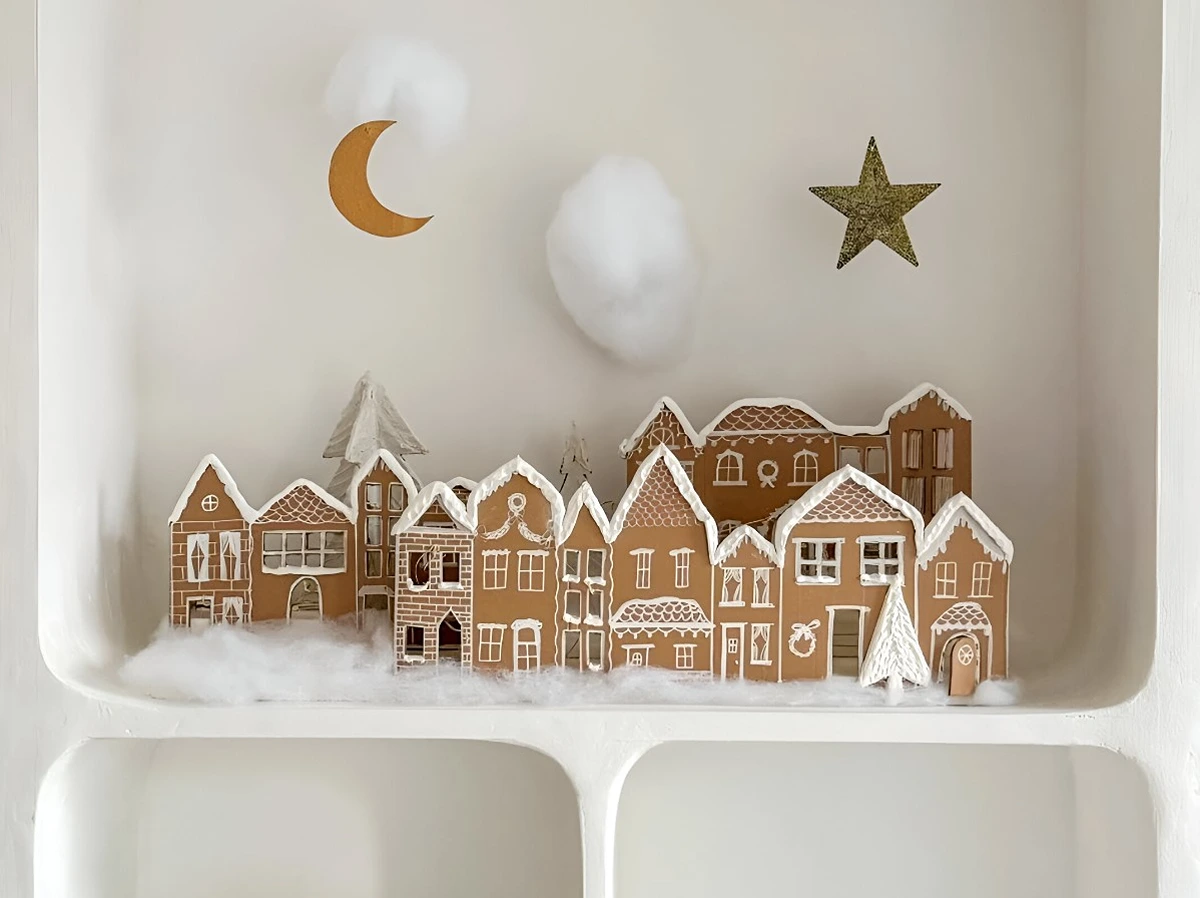Wie Sie ein winterliches Weihnachtsdorf aus Pappe basteln