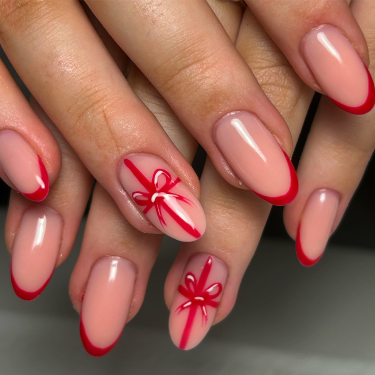 weihnachts gelnägel mit schleife mit geschenkband optik