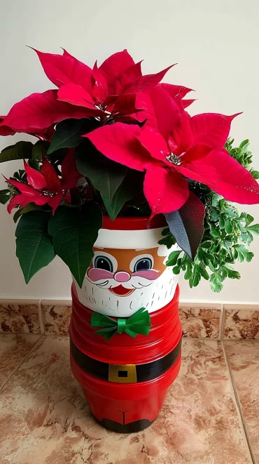 weihnachtstamnn aus tontöpfen mit weihnachtssternen darin