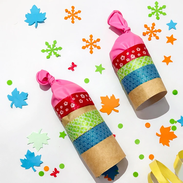 Einfache Konfettikanone mit Washi-Tape, Ballon und Klopapierrolle