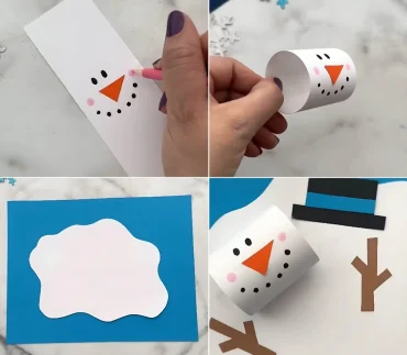 Schneemann aus einer Papierrolle auf blauem Tonpapier